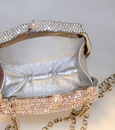 "Heart- stoppingly beautiful! These Formal Evening Purses in ALL SIAM RED, ALL SILVER GRAY, ALL LT. TOPAZ GOLD. All JET BLACK and ALL CLEAR AURORA BOREALIS Crystals in a hexagon shape will be the talk of town!! Each took a month to make, crystal by crystal! This is an evening bag that is fully covered in genuine, very fine, small sized Swarovski Crystals from Austria! Each minaudiere bag is fully crystallized in all sides with meticulous precision and spectacular detail. It is also lined in genu Crystal Evening Bag With Rhinestones, Luxury Crystal Evening Bag For Party, Glamorous Crystal Evening Bag With Bling, Formal Crystal Evening Bag With Rhinestones, Embellished Crystal Evening Bag For Formal Occasions, Sparkling Crystal Evening Bag For Events, Formal Embellished Crystal Evening Bag, Glamorous Crystal Evening Bag With Rhinestones, Elegant Crystal Evening Bag With Bling