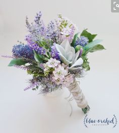 a bouquet of flowers in a glass vase