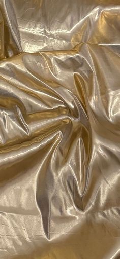 an image of a shiny metallic surface that looks like it could be used as a background