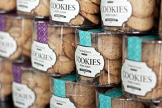 cookies in plastic containers are stacked on top of each other and labeled with the word cookies