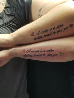 two people sitting next to each other with tattoos on their arms and the words in different languages