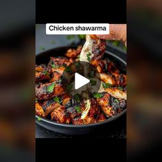 chicken shawarma being served in a pan with the words chicken shawarma on it