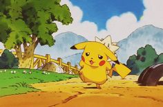 pikachu running in the dirt with a tire behind him and another person standing next to it