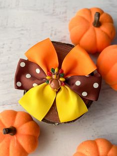 Put your best "gobble" forward with this cute-as-can-be accessory! Our Polka Dot Turkey Pinwheel Bow is the perfect, playful accessory for your Thanksgiving look. Featuring a classic turkey print accented with a festive polka dot pattern, this bow is sure to make you the star of the show! How big is my bow? Approx: 4" x 4" Clip Type: Alligator Clip Turkey Pinwheels, Thanksgiving Bow, Classic Turkey, Turkey Print, Pinwheel Bow, Hair Bow Holder