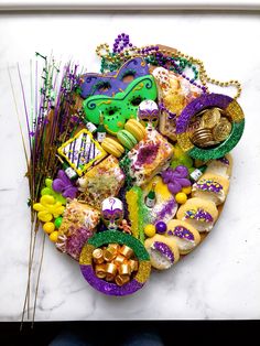 a table topped with lots of different types of food and decorations on top of it