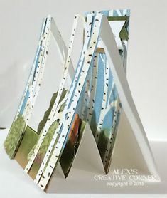 a card holder made out of paper with trees on it