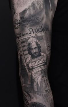 a man's arm with an image of jesus on the front and back of it