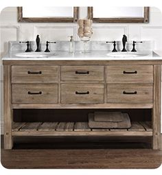 two mirrors are above the double sinks in this bathroom