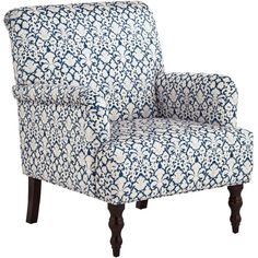 a blue and white patterned chair with wooden legs