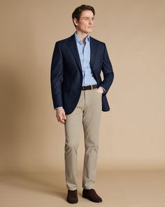 100% wool, Woolmark certified, Available in classic and slim fit, Straight flap pockets with chest pocket, Single breasted two-button fastening, Four-button non working cuff with natural sustainable buttons, Canvas chest piece construction, Back panel lining: 100% Polyester, Front panel lining: 100% polyester in exclusive Charles Tyrwhitt lapwing design, Dry clean only - Proper Blazer - Steel Blue - Proper Blazer - Steel Blue | Men's Charles Tyrwhitt Proper Blazer - Steel Blue Size 36R Wool Male Business Attire, Timeless Fitted Tweed Jacket With Pockets, Single Breasted Slim Fit Sport Coat For Business Casual, Business Casual Blue Tweed Jacket With Pockets, Business Casual Slim Fit Single Breasted Sport Coat, Blue Tweed Jacket With Pockets For Business Casual, Semi-formal Tweed Jacket With Welt Pockets, Elegant Business Casual Tweed Jacket With Patch Pockets, Slim Fit Sport Coat With Pockets For Semi-formal Occasions