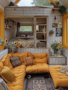 a living room filled with furniture and sunflowers