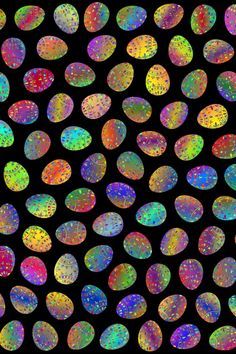 an image of many different colored circles on a black background with multicolored dots