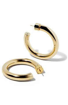 Refine everyday looks with the high-polish shine of these hoop earrings. 1" diameter; 1/4" width Post back 14k-gold plate Imported Small Gold-tone Polished Hoop Earrings, Small Gold-tone Hoop Earrings With Polished Finish, Modern Gold Hoop Earrings With Shiny Finish, Chic Polished Round Hoop Earrings, Chic Polished Finish Round Hoop Earrings, Small Hoop Earrings With Polished Finish, Gold-tone Polished Round Hoop Earrings, Gold-tone Round Hoop Earrings With Polished Finish, Classic Gold-tone Hoop Earrings