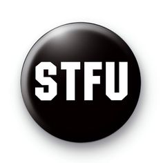 a black button with the word stfu printed in white on it's side