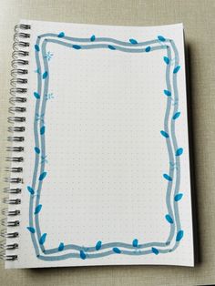 an open notebook with blue ink on it