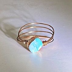 Handcrafted By Me With Love And Attention To Detail! Every Piece Is Unique & One Of A Kind. Genuine Raw Sleeping Beauty Turquoise Copper Wire Wrapped Ring. Light Weight & Delicate. So Pretty & Feminine! Size 6.5. Comes In A Gift Box, Ready To Give Or Keep For Yourself. Thank You For Supporting Creative, Small Business And Have A Blessed Day! Adjustable Aquamarine Bracelet, Adjustable Round Aquamarine Jewelry, Adjustable Aquamarine Round Jewelry, Adjustable Aquamarine Jewelry, Adjustable Aquamarine Jewelry As Gift, Light Blue Round Bohemian Jewelry, Adjustable Blue Aquamarine Jewelry, Hand-wrapped Blue Round Jewelry, Wire Wrapped Turquoise