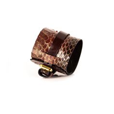 Snake Skin Cuff is made of two layers of premium Italian leather. The Serpent leather bracelet has an adjustable buckle closure. This unique artisanal handmade cuff is available in multiple color combinations. It is a distinctive fashion statement to any wardrobe. This bracelet is a great gift for women.  DETAILS 1.57"