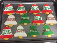 decorated cookies in the shape of christmas bells