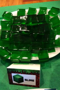 a plate that has some green cubes on it