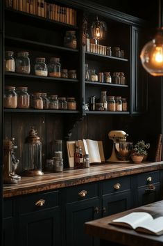 an old fashioned kitchen with lots of jars and other items on the counter top in front of it