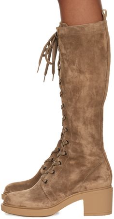 Handcrafted knee-high suede boots in brown. · Lace-up closure · Zip closure at inner side · Grosgrain pull-loop at heel collar · Logo embossed at heel · Grained leather lining · Block heel · Treaded rubber sole · Heel: H2.5 in Supplier color: Camel Brown Suede Knee-high Boots With Suede Lining, Suede Knee-high Heeled Boots With Leather Sole, Brown Suede Knee-high Boots, Brown Suede Wide Calf Knee-high Boots, Brown Wide Calf Knee-high Lace-up Boots, Brown Knee-high Wide Calf Lace-up Boots, Suede Boots Knee High, Suede Boots, Gianvito Rossi