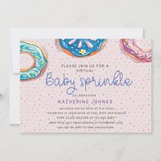 a baby sprinkle party with donuts and polka dots on the front card