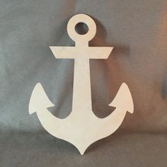 an anchor cut out on a gray background