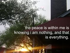 the sun is setting behind a building with a tree in front of it and a quote written below