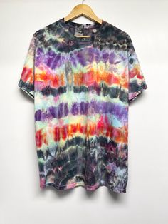 Hand made Tie-dye , 5.3 oz 100% cotton T-shirt, unisex/men size. Only one available.  International shipping:  We will refund overpaid shipping charge collected after shipping label created. We will only charge the actual shipping cost. The listing setup pricing is for each individual item under 2lbs, hoodies work well with setup, 2-3 T-shirts will be still under 2lbs if combined shipping. please let us know if you have questions. If not satisfied, please contact me. Watercolor Tie Dye, Shipping Label, Tie And Dye, Tie Dye T Shirts, Color Stripes, Bright Color, Dye T Shirt, Hand Dyeing, Cotton Tshirt