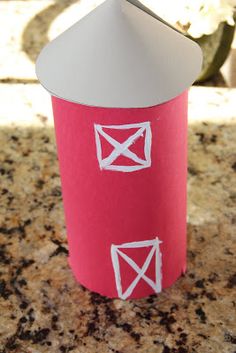 a cup with some paper on top of it