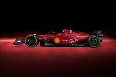 the new ferrari formula car is shown in this image, it appears to be painted red