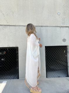 FANCY ME TASSEL KIMONO WHITE – Chic by Ally B White V-neck Kaftan For Spring, White V-neck Bohemian Kimono, White Wrap Cover-up For Spring, White V-neck Kimono For Festival, White V-neck Loungewear Cover-up, White V-neck Cover-up For Loungewear, White Flowy Cover-up With Kimono Sleeves, White Spring Festival Kimono, Casual White Kimono With Kimono Sleeves