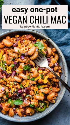 an easy one - pot vegan chili macaroni and cheese in a bowl with a spoon