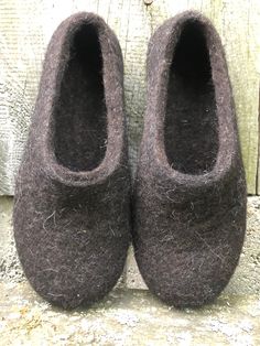 You are looking at the woolen felt clogs slippers for woman, handmade of natural black sheep wool.  Prefer wearing warm home shoes? Then these boil wool house shoes are Your choice.  It is a perfect handmade hygge gift too.   Felt clogs are the desired and needed shoes at home because they are comfy, cozy, warm, flexible, lightweight. They are recommended to wear all the round, because they warm the feet in cold season and cool in hot season. That's a magic feature of wool.  Your feet will thank Black Color Meaning, Light Color Hair, Felted Wool Slippers, Wool Clogs, Hot Season, Hygge Gifts, Wool Shoes, Felt Shoes, Warm Home