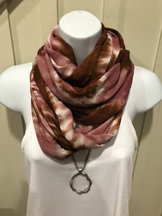 This is my newest color combo scarf and I'm IN LOVE. This 100% rayon infinity scarf was created in dutch choolate and shitake mushroom. I absolutely love this combo. Classy, yet not loud, anyone could wear this anytime. Dress up for work or dress down with a tee and jeans. This scarf measures 21x77 and can be worn more than 37 ways... Have fun with your creation. I will make one for you upon order, but don't worry will ship in a couple of days. You can wash on gentle, put in dryer and iron. It w Casual Brown Scarf For Fall, Trendy Brown Scarves For Gifts, Trendy Brown Scarves For Fall, Trendy Brown Fall Scarves, Brown Bohemian Scarves One Size, Bohemian Infinity Loop Scarf, Brown Fall Scarf, Casual One Size Loop Scarves, Casual One-size Loop Scarves