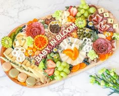 a platter filled with lots of different types of food