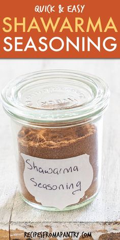 a jar filled with cinnamon spice sitting on top of a wooden table