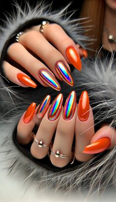 Envision bold orange nails with a holographic finish that reflects a spectrum of colors in the light. Perfect for girls who want to make a statement, this nail art is both eye-catching and unique. The holographic effect adds a touch of magic, making your nails shimmer and shine from every angle. Get inspired by this dazzling and vibrant manicure! #NailArt #HolographicNails #BoldNails #OrangeNails #NailInspiration #FashionNails Follow for more content like this! Ghost Nails, Chrome Nails Designs, Tropical Nails, Summer Nails Colors, Holographic Nails, Halloween Spirit, Fancy Nails, Dope Nails, Nail Polishes