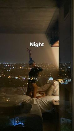 a person laying in bed with the words night above them