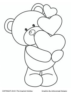 a teddy bear holding a heart shaped object