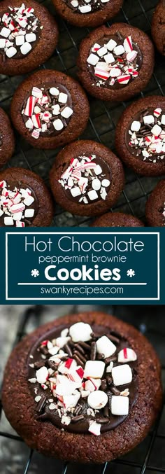 hot chocolate cookies with marshmallows and peppermints on top are cooling on the rack