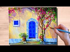 someone is painting a house with blue doors and flowers on the outside, while holding a pencil in their left hand