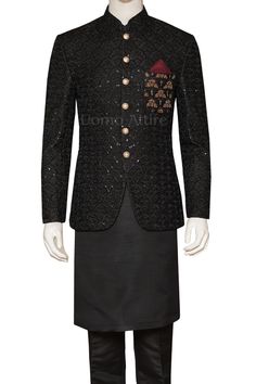 Look your best at any special event in this jet black fully embroidered prince coat paired with black kurta pajama. The intricate hand embellished golden motif adds a touch of elegance and sophistication to your look. Black Traditional Wear With Gold Embroidery For Festive Occasions, Elegant Black Traditional Wear With Gold Embroidery, Black Sherwani With Gold Embroidery For Eid, Black Sherwani With Dabka Work For Party, Black Sherwani With Gold Embroidery For Festive Occasions, Black Sherwani With Resham Embroidery For Party, Festive Black Sherwani With Gold Embroidery, Winter Designer Wear Embroidered Bandhgala, Festive Black Long Sleeve Nehru Jacket