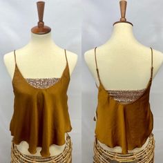 From Free People Comes This Satin Layered Camisole In Size Small With Sequin Inset In Gorgeous Amber. Whether It’s A Night In Or A Night Out You Will Be Looking Chic And Stylish In This Intimately Free People Winner. Features Adjustable Strapsboho Fun Sequin Beachy Poolside Hangin Out Nighty Night Camisole Crop Top With Built-in Bra For Vacation, Summer Party Tank Top, Bra-friendly, Summer Party Tank Top, Bra Friendly, Summer Party Tank Top Bra Friendly, Bra Friendly Sleeveless Camisole For Party, Summer Bra-friendly Tank Top For Night Out, Summer Tank Top For Night Out, Bra Friendly, Fitted Camisole With Tank Straps For Vacation, Bra-friendly Cami Top For Party