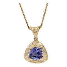 Beautiful big tanzanite trillion with white diamond rounds. Handmade in 18k yellow gold. Chain is 16". White Diamond Necklace, Yellow Gold Necklace, Crown Jewels, Yellow Gold Chain, Tanzania, Earings Piercings, White Diamond, Gold Chain, Jewelry Necklace Pendant