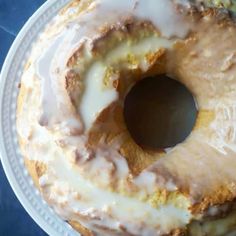 lemon donut bundt cake on a white plate with text overlay that reads, lemon donut bundt cake