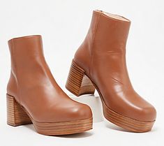 Chunky, funky, and totally chic, these stacked heeled ankle boots are here to slay with their unrivaled splash of style. Pair them with flared jeans to make a bold fashion statement. From Intentionally Blank.\n\nOriginal item is A548928. This product may be a customer return, vendor sample, or on-air display and is not in its originally manufactured condition. It may not be new. In some instances, these items are repackaged by QVC. Modern Ankle-high Spring Platform Boots, Modern Platform Boots With Stacked Heel For Fall, Trendy Ankle-high Platform Boots For Spring, Modern Fall Platform Boots With Stacked Heel, Trendy Heeled Boots With Sculpted Heel And Round Toe, Bold Ankle Platform Boots For Fall, Trendy Heeled Boots With Sculpted Block Heel, Fall Ankle Platform Boots With Stacked Heel, Trendy Heeled Boots With Sculpted Heel