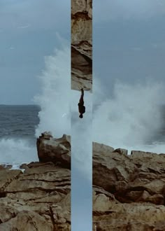 a man is standing on the edge of a cliff by the ocean while waves crash around him