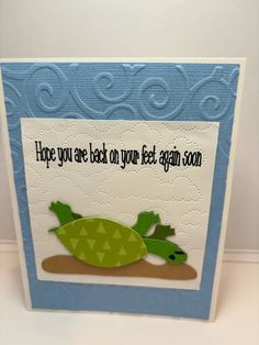 a close up of a card with a turtle on the bottom and words above it