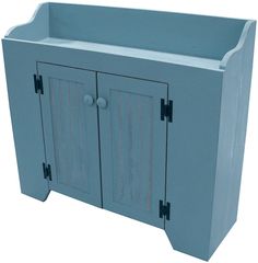 a blue cabinet with two doors and knobs